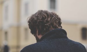 Man seen from behind